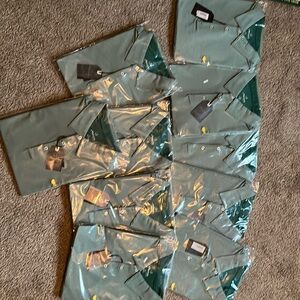 New in package with tags on Masters tech polo—size XXL